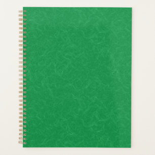 Surface verte texturée avec un motif tourbillonnan
