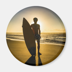Surfer-silhouet tijdens zonsopgang magneet