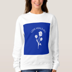 Sweatshirt à accent bleu royal "L'amour guérit tou
