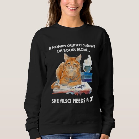 Sweatshirt A Woman Cannot Survive On Books Alone She Also Nee (Devant)