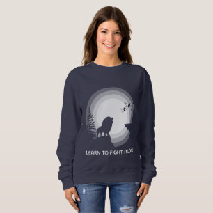 Sweatshirt Apprendre à se battre seul – Lion sous la lumière