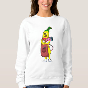 Sweatshirt Banana en coiffeur avec sèche-cheveux