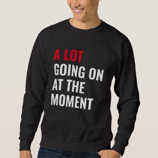 Sweatshirt Beaucoup de choses se passent à l'instant amusant (Devant)