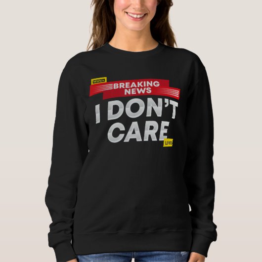 Sweatshirt Breaking News Je m'en fiche (Devant)