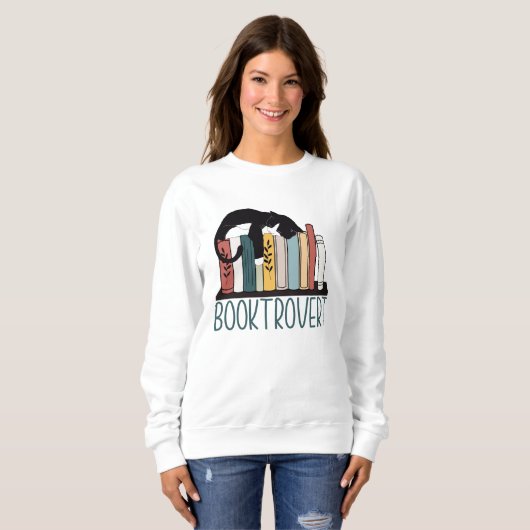 Sweatshirt Chat noir blanc dormant sur la bibliothèque (Devant entier)