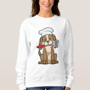 Sweatshirt Le chien cuisinier avec le casquette et la spatule