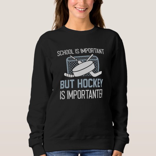 Sweatshirt L'École Est Importante, Mais Le Hockey Est Importa (Devant)