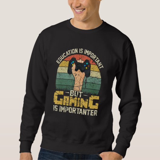 Sweatshirt L'Éducation Est Importante, Mais Le Jeu Est Import (Devant)