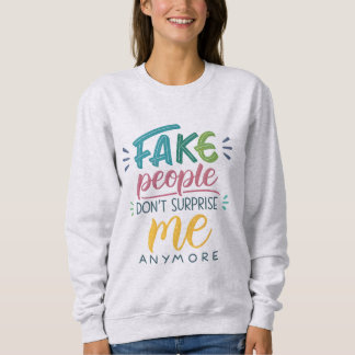 Sweatshirt Les faux gens ne me surprennent plus