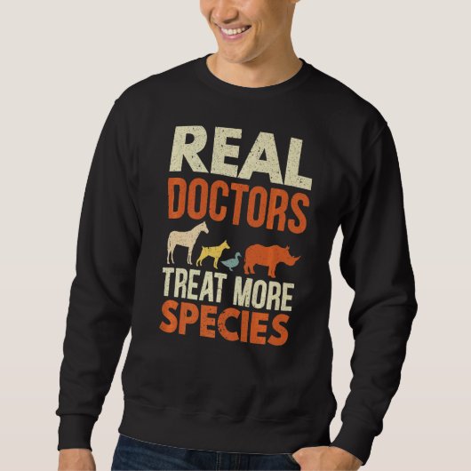Sweatshirt Les vrais médecins traitent plus d'espèces Animaux (Devant)