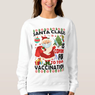 Sweatshirt Père Noël : La vaccination arrive en ville