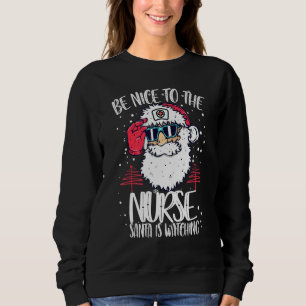 Sweatshirt Soyez Gentil Avec L'Infirmière Père Noël Regarde L