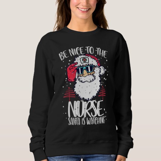 Sweatshirt Soyez Gentil Avec L'Infirmière Père Noël Regarde L (Devant)