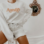 Sweatshirt TRIXIE Retro 70's Theme Orange Super Tante<br><div class="desc">Cette tante sweatshirt est décorée dans un style simple et décorée avec une police orange rétro des années 70. Ce pull-over fait le cadeau parfait pour annoncer un nouveau bébé ou pour la tante cool dans votre vie. Les couleurs sont modifiables ! Cliquez sur "modifier la conception" pour modifier les...</div>