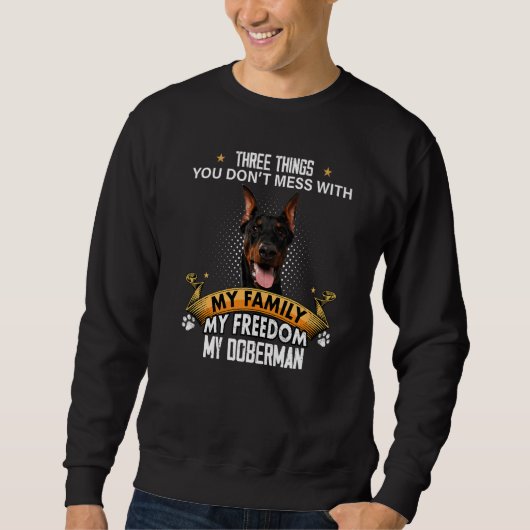 Sweatshirt Trois choses que vous ne manquez pas avec Doberman (Devant)