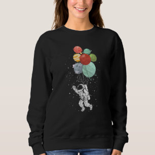 Sweatshirt Un astronaute tenant des ballons planètes Espace M