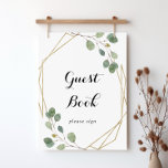 Symbole du livre d'or Géométrique Foligraphie<br><div class="desc">Ce panneau de calligraphie de feuillage géométrique doré est parfait pour un mariage rustique ou une douche nuptiale. Le design présente des branches d'eucalyptus vert et botanique dessinées à la main et des feuilles ornant un cadre élégant. Faites la ligne de texte au bas du panneau vous-même en incluant la...</div>