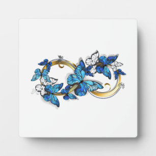 Symbool oneindigheid van blauwe Morpho vlinders Fotoplaat