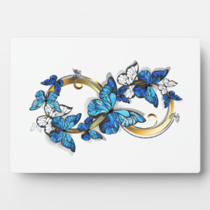 Symbool oneindigheid van blauwe Morpho vlinders Fotoplaat