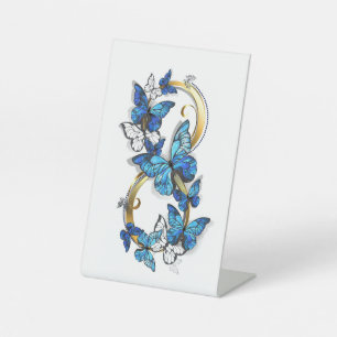 Symbool oneindigheid van Blauwe Morpho Vlinders Reclamebord Met Voetstuk