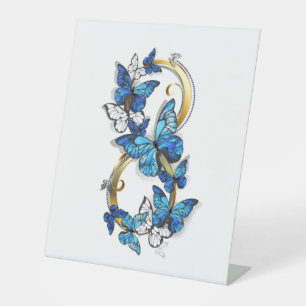 Symbool oneindigheid van Blauwe Morpho Vlinders Reclamebord Met Voetstuk