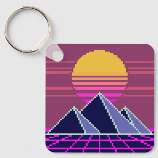 Synthwave zonsondergang over piramides pixel art sleutelhanger