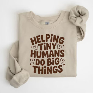 T-shirt Aider les tout-petits à faire de grandes choses