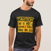 T-shirt Attention Ce N'Est Pas Un Costume Broken Leg Hallo (Devant)