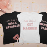 T-shirt Bachelorette Party Most Likely To Dance On Tables<br><div class="desc">This funny personalized bachelorette party "Most likely to dance on tables" t-shirt is the perfect way to celebrate the bride-to-be! The playful script and modern font create a trendy look, while the spacious back design provides plenty of room for additional personalization or group names. Whether you're hitting the town or...</div>