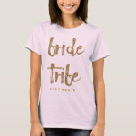 T-shirt Bride Tribe Gold Parties scintillant Bachelorette<br><div class="desc">Ce t-shirt de la tribu des mariées est parfait pour célébrer des fêtes de bachelorette. Cette chemise rose vif présente un style parties scintillant en faux or et des lettres sur le devant. Personnalisez ces tee - shirts avec le nom de votre destinataire sur le devant et le nom de...</div>
