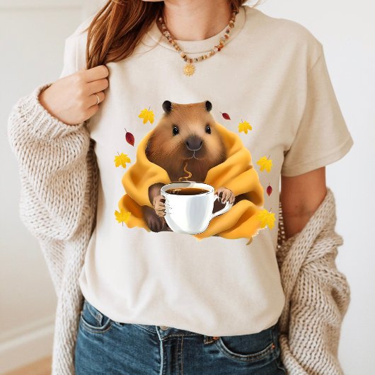 T-shirt Capybara dans une couverture confortable se détend