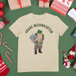 T-shirt Caricature Belsnickel Noël personnalisé<br><div class="desc">Souhaitez à tous une Frohe Weihnachten (Joyeux Noël en allemand) avec ce tee graphique Belsnickel amusant ou changez le texte en votre propre message personnalisé. Le t-shirt présente un dessin animé représentant le Belsnickel. Ce personnage de conte populaire de vacances a ses racines dans la région palatinat de l'Allemagne et...</div>