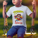 T-shirt Caricature cool Superhero Comic Book Boy's Birthda<br><div class="desc">Célébrez en style avec notre t-shirt de fête d'anniversaire de bande dessinée super-héros garçon! Avec des couleurs vives et des graphismes pleins d'action, cette chemise est parfaite pour les jeunes héros prêts à sauver la journée. De plus, personnalisez-le avec le nom du récipiendaire pour une touche spéciale supplémentaire qui leur...</div>