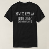 T-shirt Comment Garder Un Idiot Occupé (Design devant)