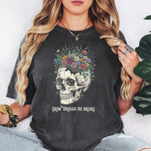 T-shirt Crâne avec fleurs "Pousse à travers les cassures" 