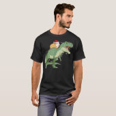 T-shirt Drôle Guinéen équitation Noël Lumière T Rex Dino (Devant entier)