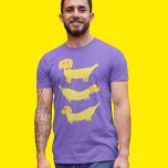 T-shirt En Tri-matière Chiens de banane jaune mignon<br><div class="desc">Ce tee-shirt graphique amusant présente des illustrations de trois chiens faits de bananes jaunes ou de chiens de bananes.</div>