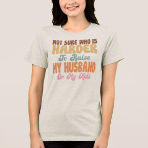 T-shirt En Tri-matière Pas sûr qui est le plus dur à élever Mon mari Mes