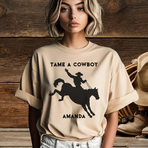 T-shirt femme 'Domptage d'un cowboy sur un cheval'