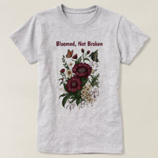 T-shirt floral inspirant "Épanoui, pas brisé"