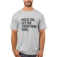 GARDEZ-MOI RÉFLÉCHIR À CE T-shirt.