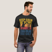 T-shirt Gardez votre calme et jouez au golf sur disque pou (Devant entier)