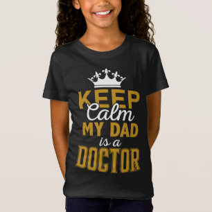 T-Shirt Gardez votre calme, mon père est un docteur fille 