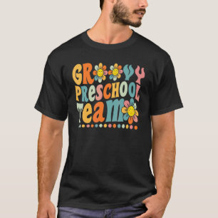 T-shirt Groovy Équipe de maternelle Daisy colorée retour à
