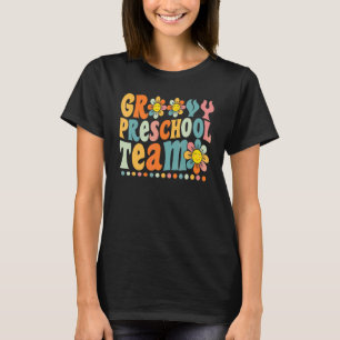 T-shirt Groovy Équipe de maternelle Daisy colorée retour à