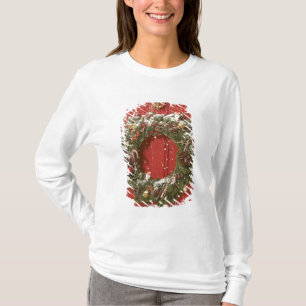 T-shirt Guirlande de Noël accrochant sur une porte