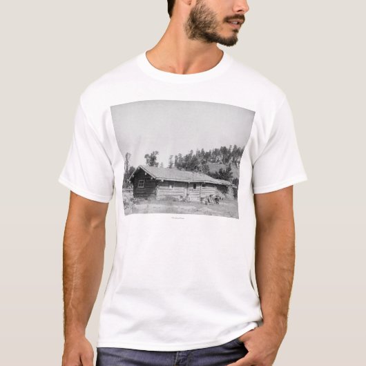 T-shirt Hommes s'asseyant en dehors du cabine de rondin (Devant)