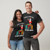 T-shirt IL Y A QUELQUES CHOSES DANS CETTE MAISON Père Noël (Unisexe)