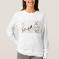 Image de moineau chantant dans l'arbre fleurissant