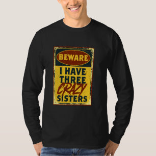 T-shirt J'Ai Trois Soeurs Folles Méfiez-Vous D'Un Avertiss